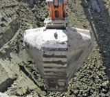 Entenda o papel da concha trapezoidal para escavadeira